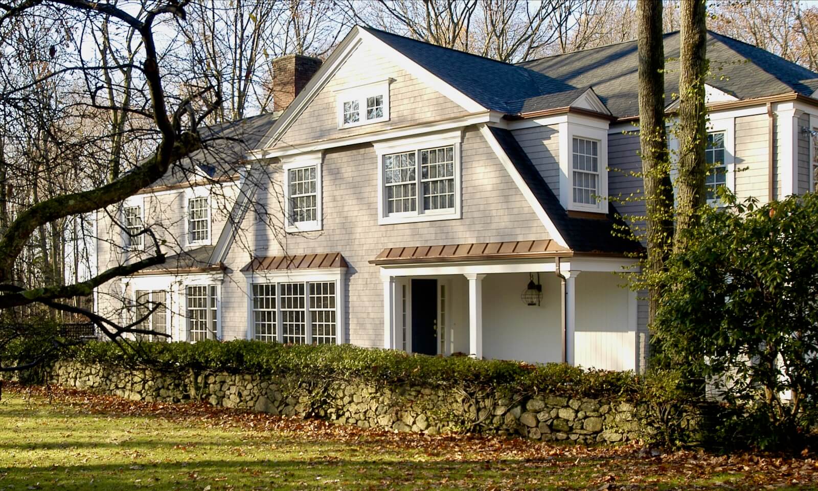 view of entry and front of shingle style gambrel house by Duxbury MA architect