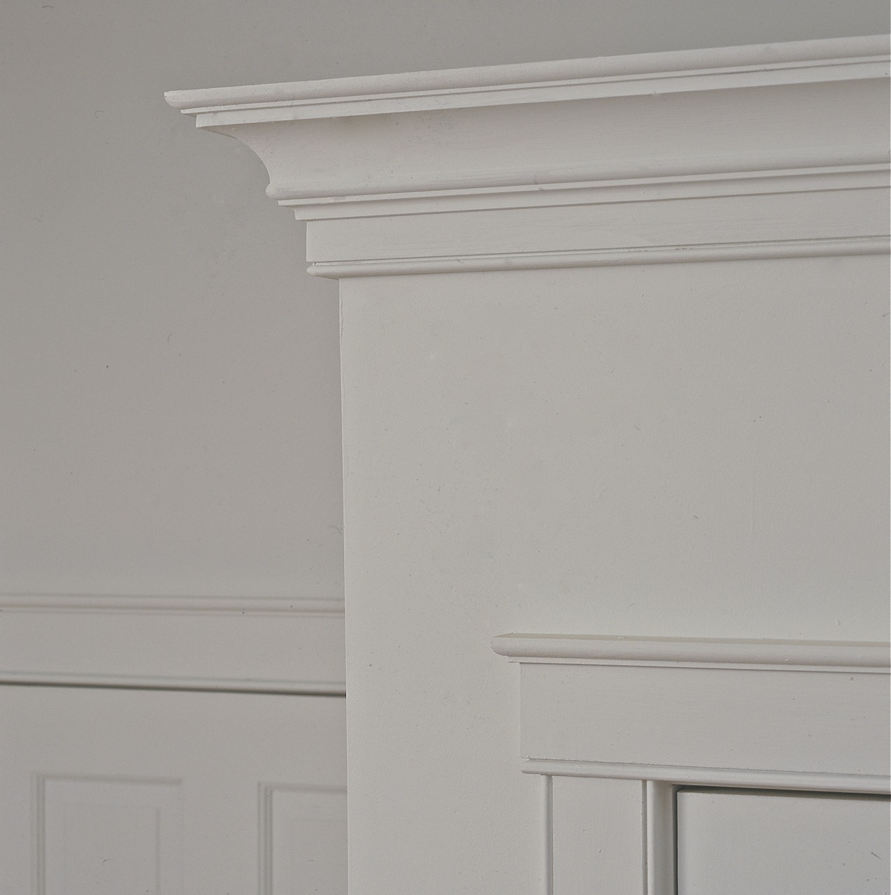 Custom crown molding, door and window casing detail by Duxbury MA design build firm