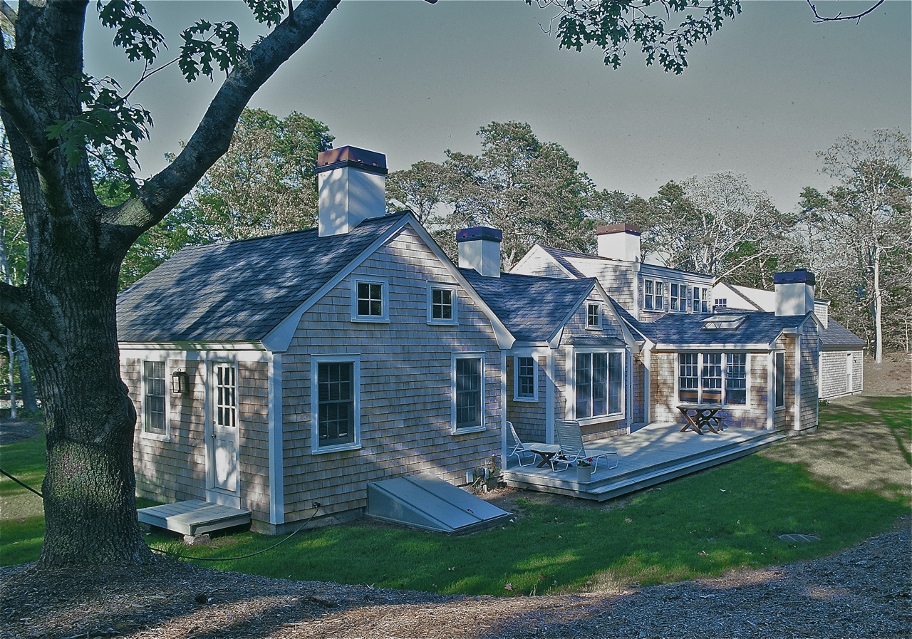 Exterior gables, awning windows, “Tory Stripe” chimney, Cape Cod House, chatham MA