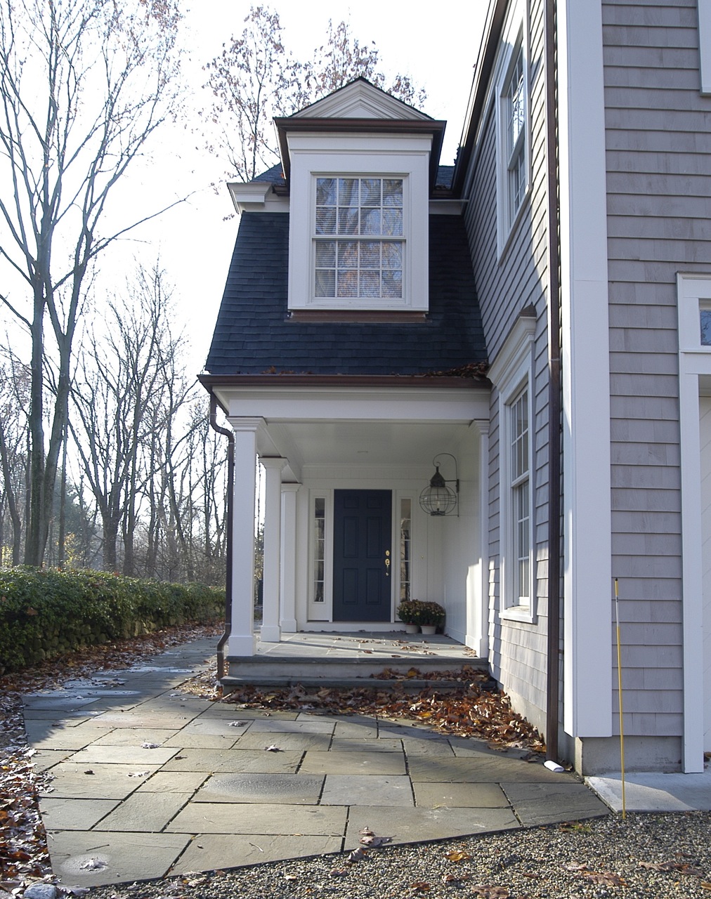 Entry porch with doghouse dormer in Gambrel roof