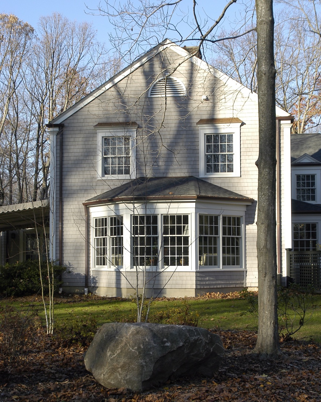 Living room addition- bay windows with copper roof