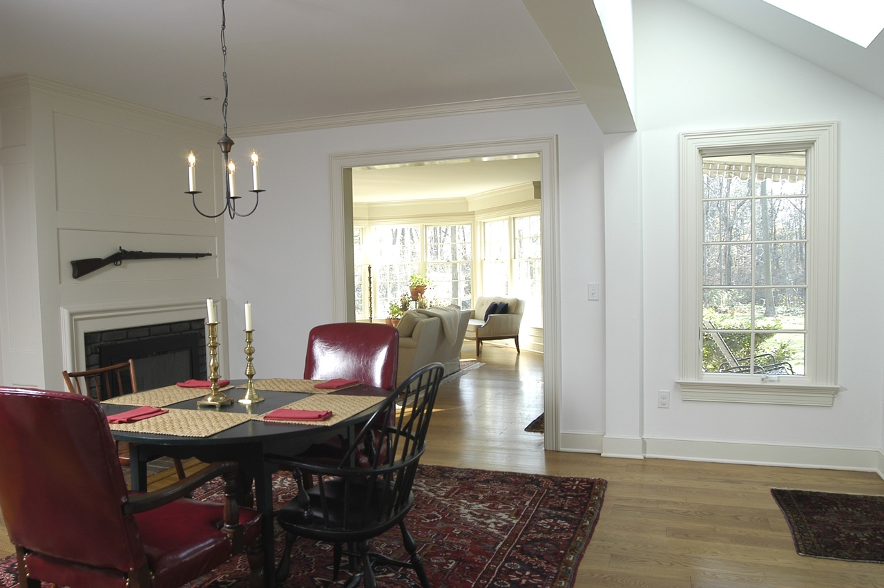 view across family room to living room bay windows in New Canaan CT shingle style whole house renovation