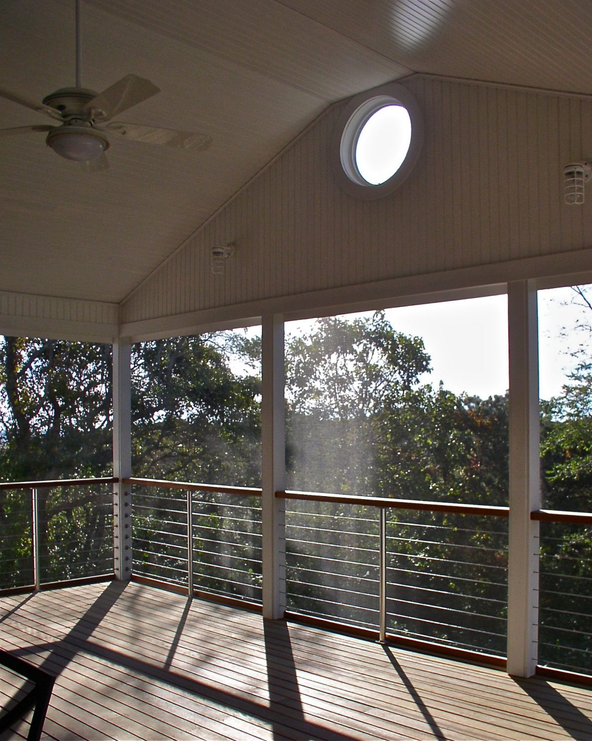 Screened porch with cable rails, Cape Cod house