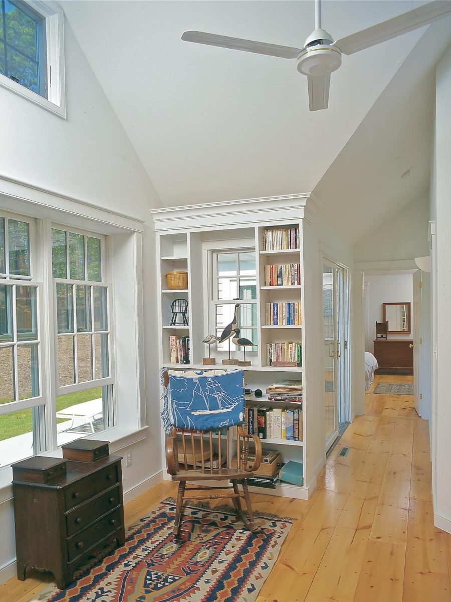 Vaulted living area in hallway of classic Cape Cod house in Chatham MA.